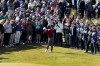 Northern Ireland's Rory McIlroy, center, after his shot from the rough on the 2nd during day one of the Amgen Irish Open 2024 at Royal County Down in Newcastle, Ireland, Thursday Sept. 12, 2024. (Liam McBurney/PA via AP)