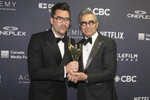 Daniel Levy and Eugene Levy pose for a photo after winning the Award for 
