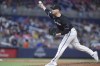 Right-handed pitcher Brett de Geus has claimed off waivers by the Toronto Blue Jays from the Miami Marlins. De Geus delivers a pitch during the eighth inning of a baseball game against the Chicago Cubs, in Miami, Friday, Aug. 23, 2024. THE CANADIAN PRESS/AP-Wilfredo Lee