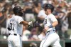 Detroit Tigers' Jace Jung, right, celebrates scoring with Riley Greene (31) against the Colorado Rockies in the fourth inning of a baseball game, Thursday, Sept. 12, 2024, in Detroit. (AP Photo/Paul Sancya)