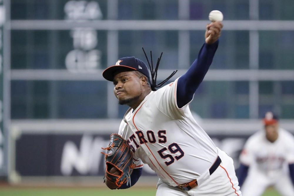 Houston Astros starting pitcher Framber Valdez throws against the Oakland Athletics during the first inning of a baseball game Thursday, Sept. 12, 2024, in Houston. (AP Photo/Michael Wyke)