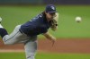 Tampa Bay Rays' Ryan Pepiot pitches in the first inning of a baseball game against the Cleveland Guardians, Thursday, Sept. 12, 2024, in Cleveland. (AP Photo/Sue Ogrocki)
