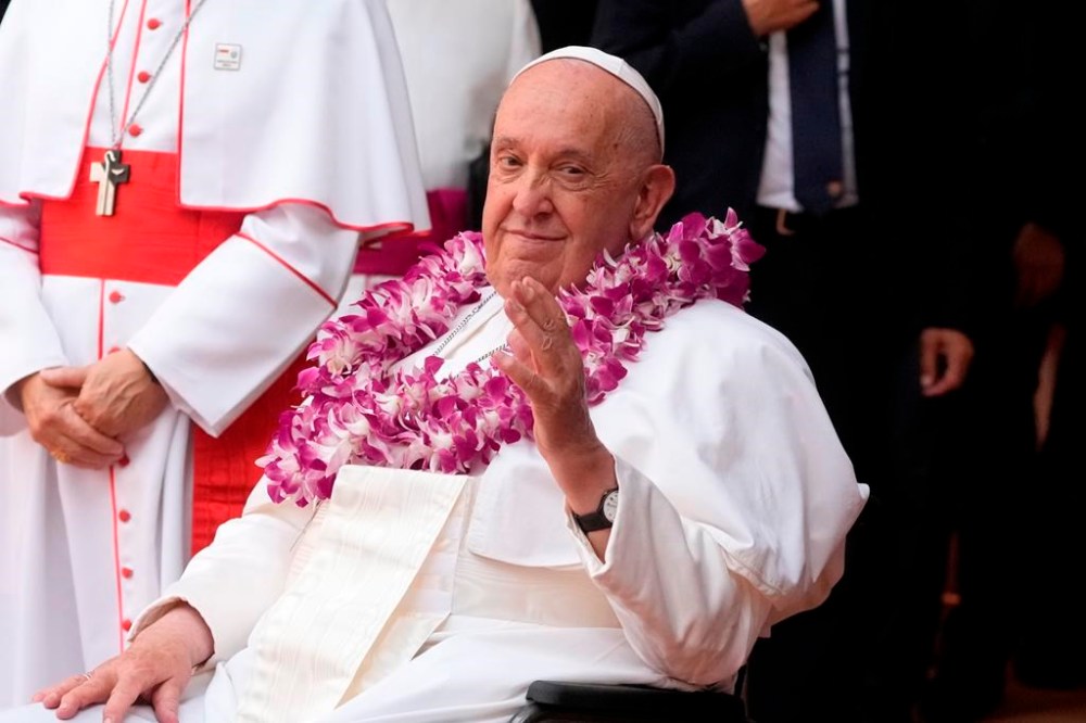 Pope Francis attends an interreligious meeting with young people at the Catholic Junior College in Singapore, Friday, Sept. 13, 2024. Pope Francis is wrapping up his visit to Singapore by praising its tradition of interfaith harmony. (AP Photo/Gregorio Borgia)