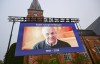 A general view of a screen outside Fryksande Church in Torsby, Sweden, ahead of the funeral for football legend Sven-Goran Eriksson, Friday, Sept. 13, 2024. (Jonas EkströmerTT News Agency via AP)