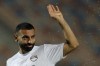 Egypt's Mohamed Salah greets his fans before his team's Africa Cup of Nations Group C qualifying soccer match against Cape Verde in Cairo Stadium, Egypt. Friday, Sept. 6, 2024. (AP Photo/Amr Nabil)