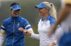 CORRECTS ID AT LEFT TO ESTHER HENSELEIT, NOT LINN GRANT- Europe's Charley Hull, right, is congratulated by Esther Henseleit after making a putt on the 10th hole during a Solheim Cup golf tournament foursomes match at Robert Trent Jones Golf Club, Friday, Sept. 13, 2024, in Gainesville, Va. (AP Photo/Matt York)