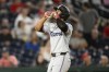 Miami Marlins' Otto Lopez celebrates after his home run during the fourth inning of a baseball game against the Washington Nationals, Friday, Sept. 13, 2024, in Washington. (AP Photo/Nick Wass)