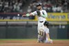 Chicago White Sox third base Lenyn Sosa throws to first after forcing Oakland Athletics' JJ Bleday out at second and gets Jacob Wilson at first to complete the double play during the sixth inning of a baseball game Friday, Sept. 13, 2024, in Chicago. (AP Photo/Charles Rex Arbogast)