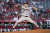 Houston Astros starting pitcher Yusei Kikuchi throws during the first inning of a baseball game against the Los Angeles Angels in Anaheim, Calif., Friday, Sept. 13, 2024. (AP Photo/Ashley Landis)