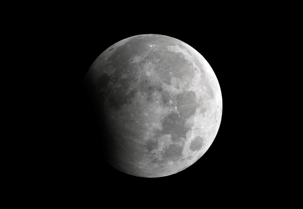 FILE - A partial lunar eclipse is seen in Karachi, Pakistan, Oct. 29, 2023. (AP Photo/Fareed Khan, File)