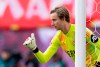 Berlin goalkeeper Frederik R'nnow reacts on the pitch during a match between RB Leipzig and FC Union Berlin in Leipzig, Germany, Saturday, Sept. 14, 2024. (Hendrik Schmidt/dpa via AP)