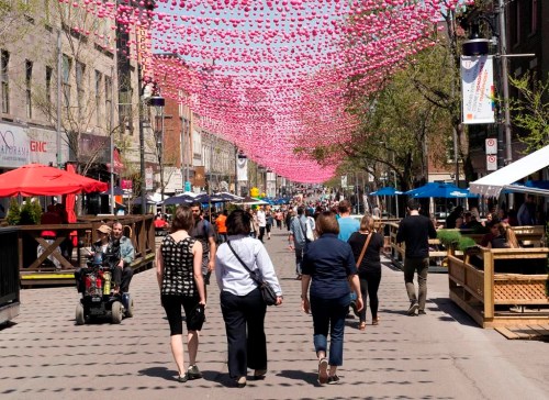 Restaurant terraces line St. Catherine Street in downtown Montreal, Wednesday, May 6, 2015. THE CANADIAN PRESS/Ryan Remiorz