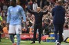Liverpool's manager Arne Slot, center, gestures during the English Premier League soccer match between Liverpool and Nottingham Forest at Anfield Stadium in Liverpool, England, Saturday, Sept. 14, 2024. (AP Photo/Rui Vieira)