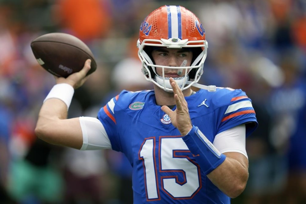 Florida quarterback Graham Mertz warms up before an NCAA college football game against Texas A&M, Saturday, Sept. 14, 2024, in Gainesville, Fla. (AP Photo/John Raoux)