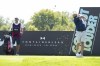Captain Jon Rahm, right, of Legion XIII, hits from the fourth tee during the second round of LIV Golf Chicago at Bolingbrook Golf Club, Saturday, Sept. 14, 2024, in Bolingbrook, Ill. (Charles Laberge/LIV Golf via AP)