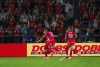 St. Louis City forward Simon Becher (11) jumps on the back of Cedric Teuchert, left, after Teuchert scored the opening goa of the first half of an MLS soccer match against Minnesota United, Saturday, Sept. 14, 2024, in St. Louis, Mo. (Zachary Linhares/St. Louis Post-Dispatch via AP)