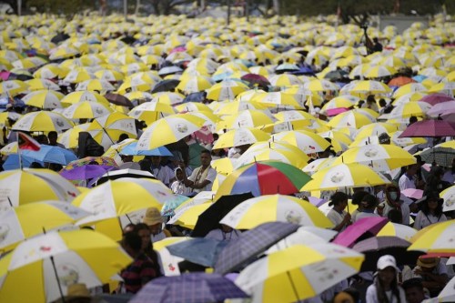 East Timorese crowd Tacitolu park for Pope Francis' Mass in Dili, East Timor, Tuesday, Sept. 10, 2024. (AP Photo/Dita Alangkara)
