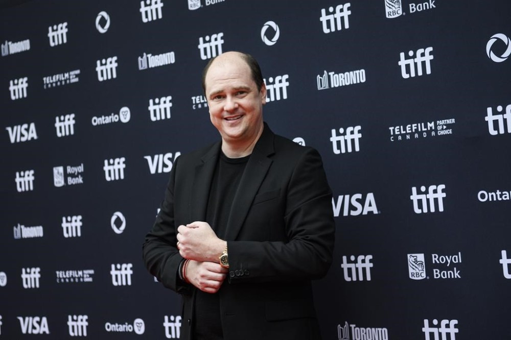 Director Mike Flanagan arrives on the red carpet ahead of the film