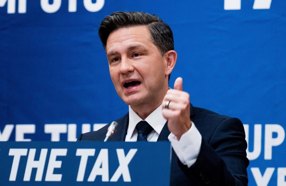Conservative Leader Pierre Poilievre addresses his caucus on Parliament Hill in Ottawa, on Sunday, Sept. 15, 2024. Parliament is schedule to resume Monday following summer recess. THE CANADIAN PRESS/Spencer Colby