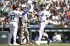 Detroit Tigers' Riley Greene, right, is congratulated by Andy Ibáñez after hitting a two-run home run off Baltimore Orioles starting pitcher Cade Povich in the third inning of a baseball game, Sunday, Sept. 15, 2024, in Detroit. (AP Photo/Jose Juarez)