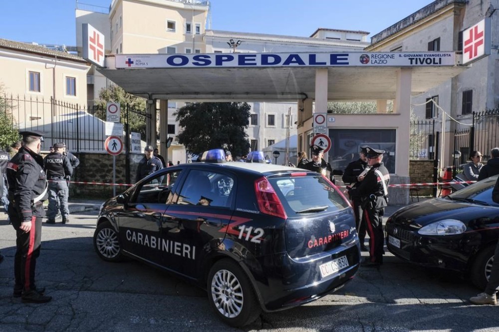FILE - Carabinieri (Italian paramilitary police) officers outside the San Giovanni Evangelista Hospital in Tivoli, Italy, on Dec. 9, 2023. (Mauro Scrobogna/LaPresse via AP, File)