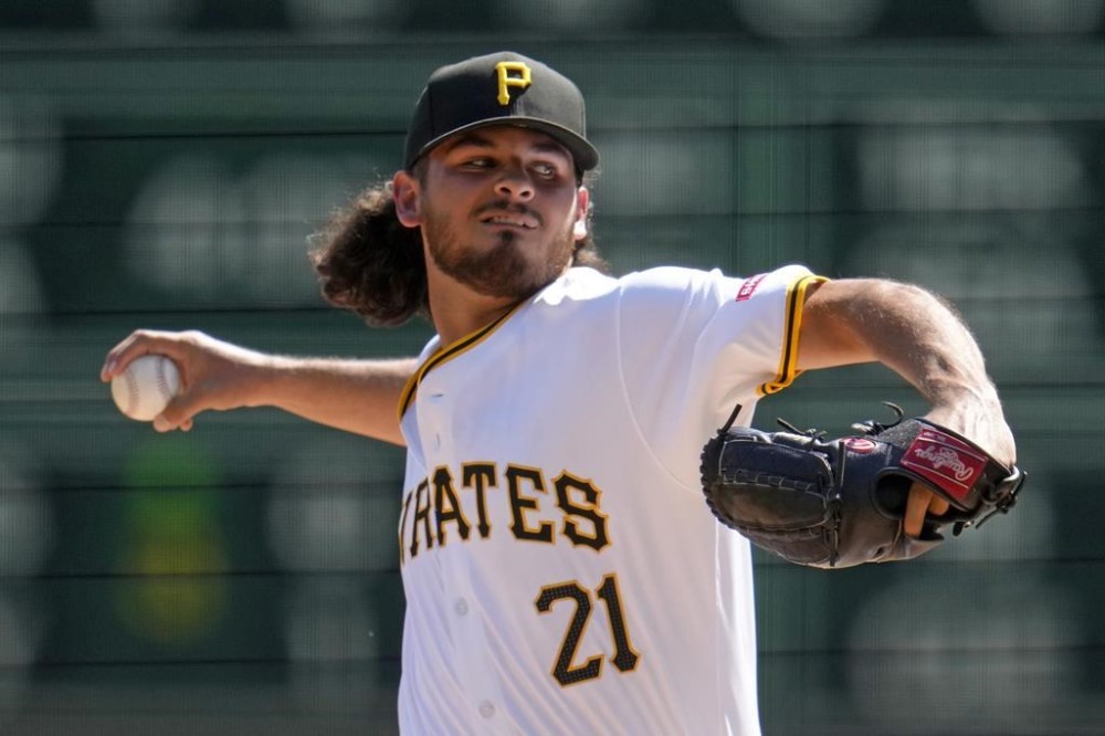 Pittsburgh Pirates pitcher Jared Jones delivers during the third inning of a baseball game against the Kansas City Royals in Pittsburgh, Sunday, Sept. 15, 2024. (AP Photo/Gene J. Puskar)
