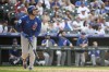 Chicago Cubs' Michael Busch reacts after hitting a one-run home run in the ninth inning of a baseball game against the Colorado Rockies, Sunday, Sept. 15, 2024, in Denver. (AP Photo/Geneva Heffernan)