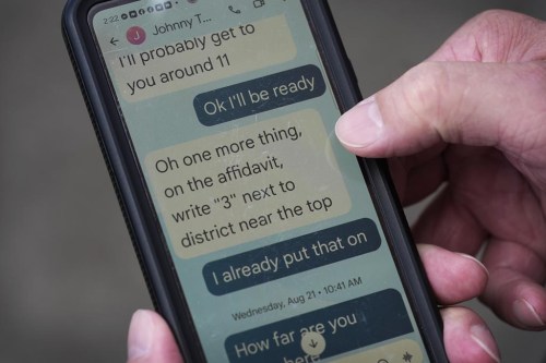 Joseph Wiederien shows a text exchange with a political operative he knew only as 