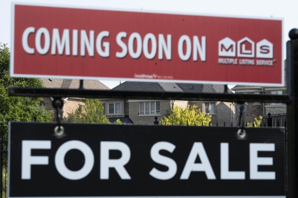 The Canadian Real Estate Association says the number of homes sold in August fell compared with a year ago as the national market remained largely stuck in a holding pattern despite borrowing costs beginning to come down.A real estate sign is shown in Vaughan, Ont. on Thursday Sept. 12, 2024. THE CANADIAN PRESS/Paige Taylor White