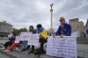 Ryan Wesley Routh, right, takes part in a rally in central Kyiv, Ukraine, Saturday, April 30, 2022. (AP Photo/Efrem Lukatsky)