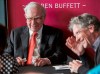 FILE - Warren Buffett, Chairman and CEO of Berkshire Hathaway, left, plays bridge with Bill Gates, following the annual Berkshire Hathaway shareholders meeting on May 5, 2019 in Omaha, Neb. (AP Photo/Nati Harnik, File)