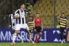 Udinese's Lorenzo Lucca, front, celebrates after scoring his side's first goal during the Serie A soccer match between Parma and Udinese in Parma, Italy, Monday Sept. 16, 2024 (Massimo Paolone/LaPresse via AP)