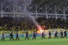 FILE - Riot police stand guard after fans threw flares before the Cyprus' cup soccer match between AEL and Apollon at Alpha Mega stadium in Kolossi near Limassol, Cyprus, Jan. 24, 2024. (AP Photo/File)