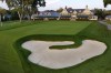 This is the ninth green in front of the clubhouse at Oakmont Country Club, in Oakmont, Pa., on Monday, Sept. 16, 2024. (AP Photo/Gene J. Puskar)