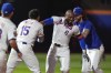 New York Mets' Starling Marte (6) celebrates with teammates after a baseball game against the Washington Nationals, Monday, Sept. 16, 2024, in New York. (AP Photo/Frank Franklin II)