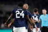 Aston Villa's Amadou Onana, left, celebrates with his teammate Youri Tielemans, right, after scoring his side's third goal during the Champions League opening phase soccer match between Young Boys Bern and Aston Villa in Bern, Switzerland, Tuesday, Sept. 17, 2024. (Peter Klaunzer/Keystone via AP)