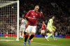 Manchester United's Christian Eriksen celebrates after scoring the 6th goal during the English League Cup soccer match between Manchester United and Barnsley at Old Trafford, Manchester, England, Tuesday, Sept. 17, 2024. (AP Photo/Dave Thompson)