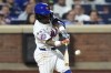 New York Mets' Luisangel Acuna hits a home run during the eighth inning of a baseball game against the Washington Nationals, Tuesday, Sept. 17, 2024, in New York. (AP Photo/Frank Franklin II)