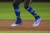 Seattle Mariners' Julio Rodriguez wears cleats featuring Swarovski crystals during the third inning of a baseball game against the New York Yankees, Tuesday, Sept. 17, 2024, in Seattle. (AP Photo/Stephen Brashear)