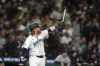 Seattle Mariners' Justin Turner reacts to hitting a solo home run against the New York Yankees during the eighth inning of a baseball game Wednesday, Sept. 18, 2024, in Seattle. (AP Photo/Lindsey Wasson)
