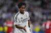 Real Madrid's Endrick celebrates after scoring his side's third goal during the Champions League opening phase soccer match between Real Madrid and VfB Stuttgart at the Santiago Bernabeu stadium, in Madrid, Tuesday, Sept. 17, 2024. Real Madrid won 3-1. (AP Photo/Manu Fernandez)