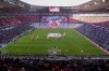 FILE - Flower wreaths surround a photograph of Bayern and Germany legend Franz Beckenbauer on the pitch of the Allianz Arena in Munich, Germany, Friday, Jan. 19, 2024, before a memorial service. (AP Photo/Matthias Schrader, file)