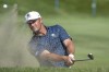 Captain Bryson DeChambeau, of Crushers GC, hits from a bunker on the 12th hole during the first round of LIV Golf Chicago at Bolingbrook Golf Club, Friday, Sept. 13, 2024, in Bolingbrook, Ill. (Matthew Harris/LIV Golf via AP)