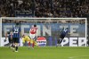 Atalanta's Mateo Retegui, right, misses to score a penalty during the Champions League opening phase soccer match between Atalanta and Arsenal at the Bergamo's stadium in Bergamo, Italy, Thursday, Sept. 19, 2024. (AP Photo/Antonio Calanni)