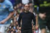 Manchester City's head coach Pep Guardiola reacts during the English Premier League soccer match between Manchester City and Brentford at the Etihad Stadium in Manchester, England, Saturday, Sept. 14, 2024. (AP Photo/Scott Heppel)