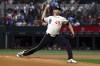 Texas Rangers starting pitcher Jacob deGrom (48) delivers in the first inning of a baseball game against the Seattle Mariners, Friday, Sept. 20, 2024, in Arlington, Texas. (AP Photo/Richard W. Rodriguez)