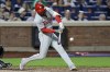 Philadelphia Phillies' Johan Rojas hits a two-run scoring ground rule double during the fourth inning of a baseball game against the New York Mets, Friday, Sept. 20, 2024, in New York. (AP Photo/Adam Hunger)