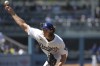 FILE - Los Angeles Dodgers' Tyler Glasnow delivers to the plate against the Pittsburgh Pirates during a baseball game Aug. 11, 2024, in Los Angeles. (AP Photo/Jayne-Kamin-Oncea, File)