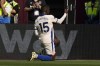 Chelsea's Nicolas Jackson celebrates after he scored during the English Premier League soccer match between West Ham United and Chelsea at the London stadium in London, Saturday, Sept. 21, 2024. (AP Photo/Alastair Grant)