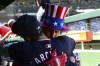 Washington Nationals' Joey Gallo, right, celebrates with teammate Luis Garcia Jr., in the dugout after hitting a three-run home run during the sixth inning of a baseball game against the Chicago Cubs in Chicago, Saturday, Sept. 21, 2024. (AP Photo/Paul Beaty)
